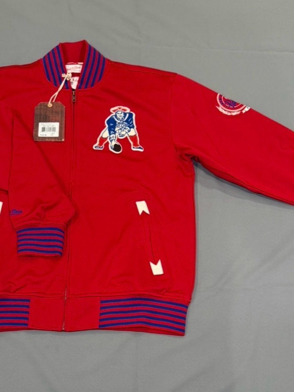 Mitchell & Ness New England Patriots Red Mens Jacket with Blue Stripe Cuffs